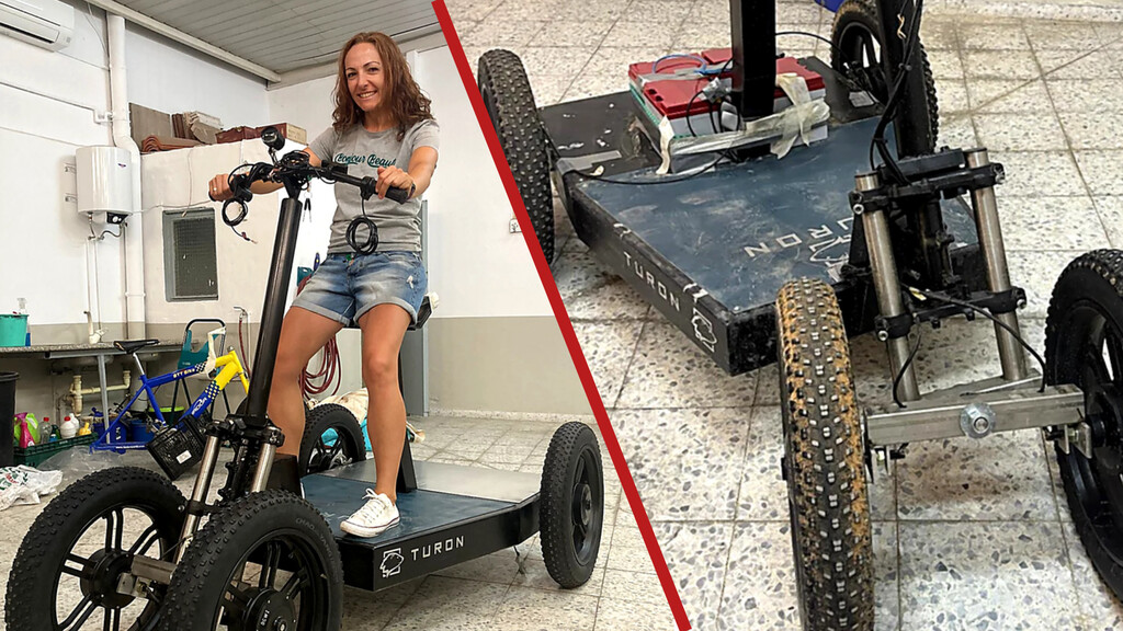 Patinete eléctrico agrícola Turon 4X en un campo de cultivo con terreno accidentado